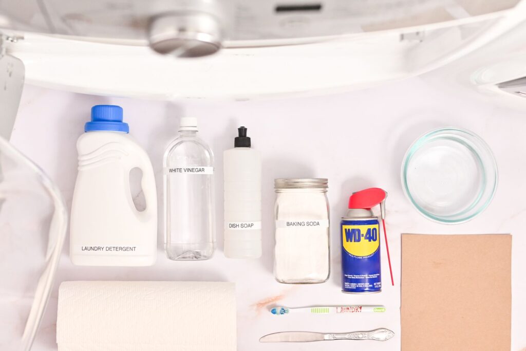 A layout of all the cleaning supplies you may need to remove the oil stains from your clothes